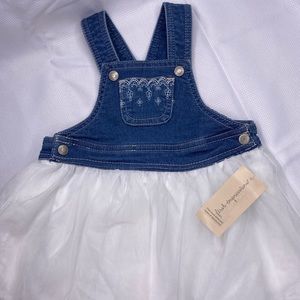 Denim summer dress with adjustable straps.